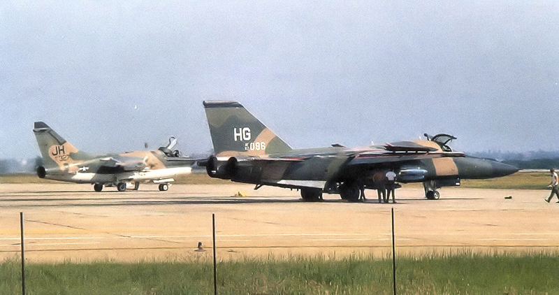 Note split middle opening canopy and all sorts of flight control surfaces of the F-111. The A-7 in the background was far simpler. The early, and to some degree all F-111s, had major problems with their systems and never really worked right... they were replaced very early for their intro to service date by the F-15E Strike Eagle
